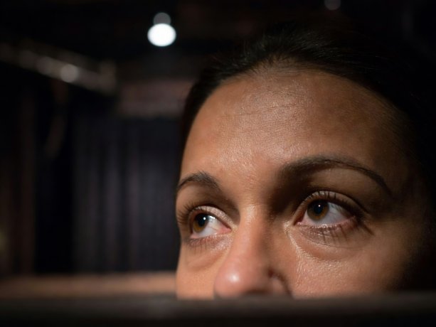 A performer holding a glance before answering a question